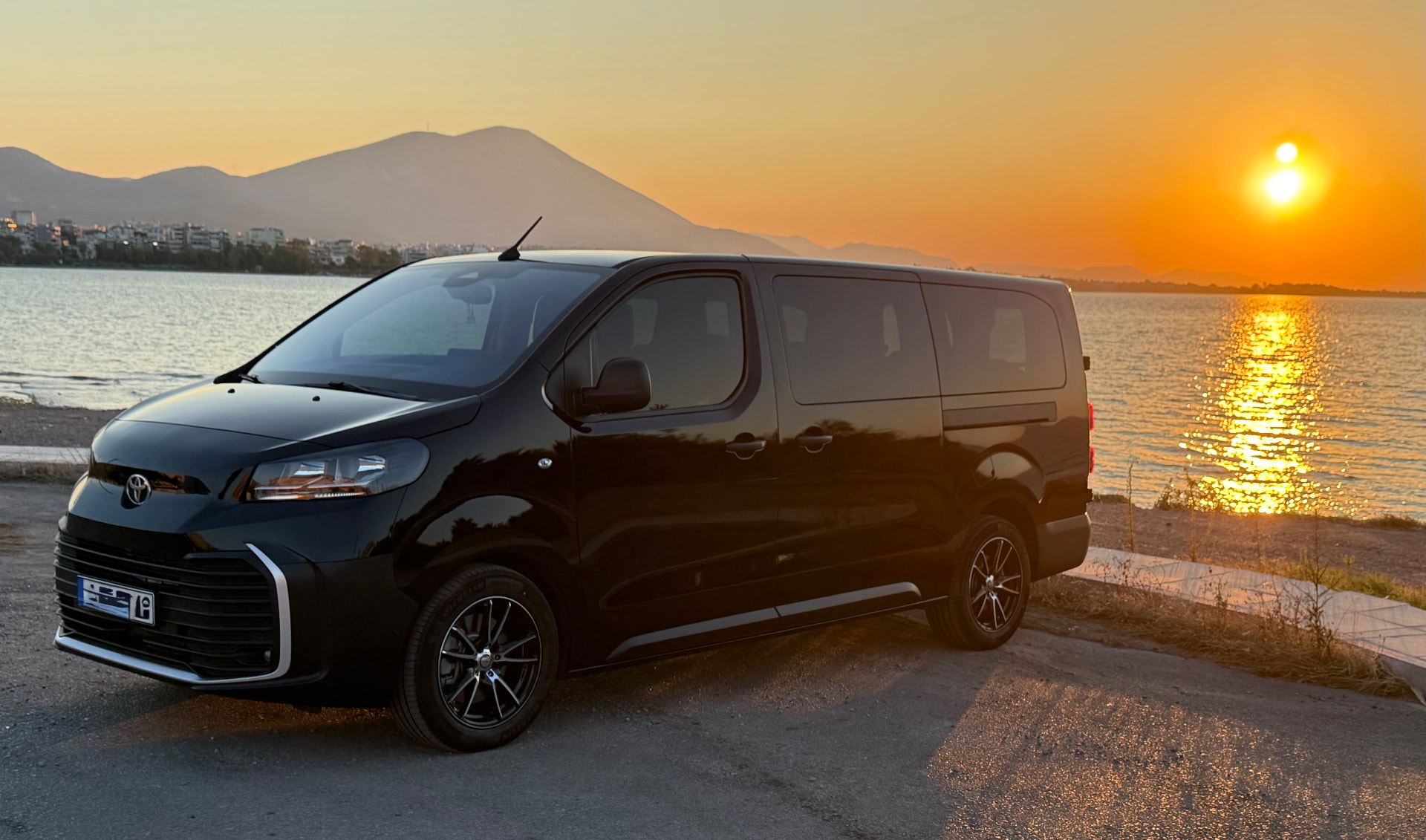 TOYOTA PROACE verso transfer van on a Greek coastal road